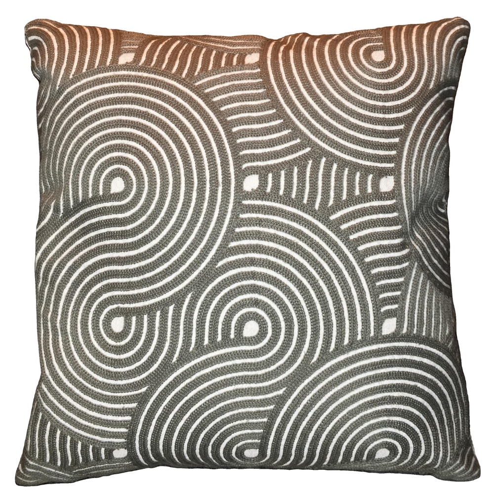 Decorative pillow with circular pattern on a white background