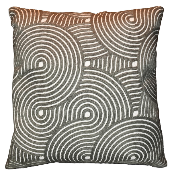 Decorative pillow with circular pattern on a white background