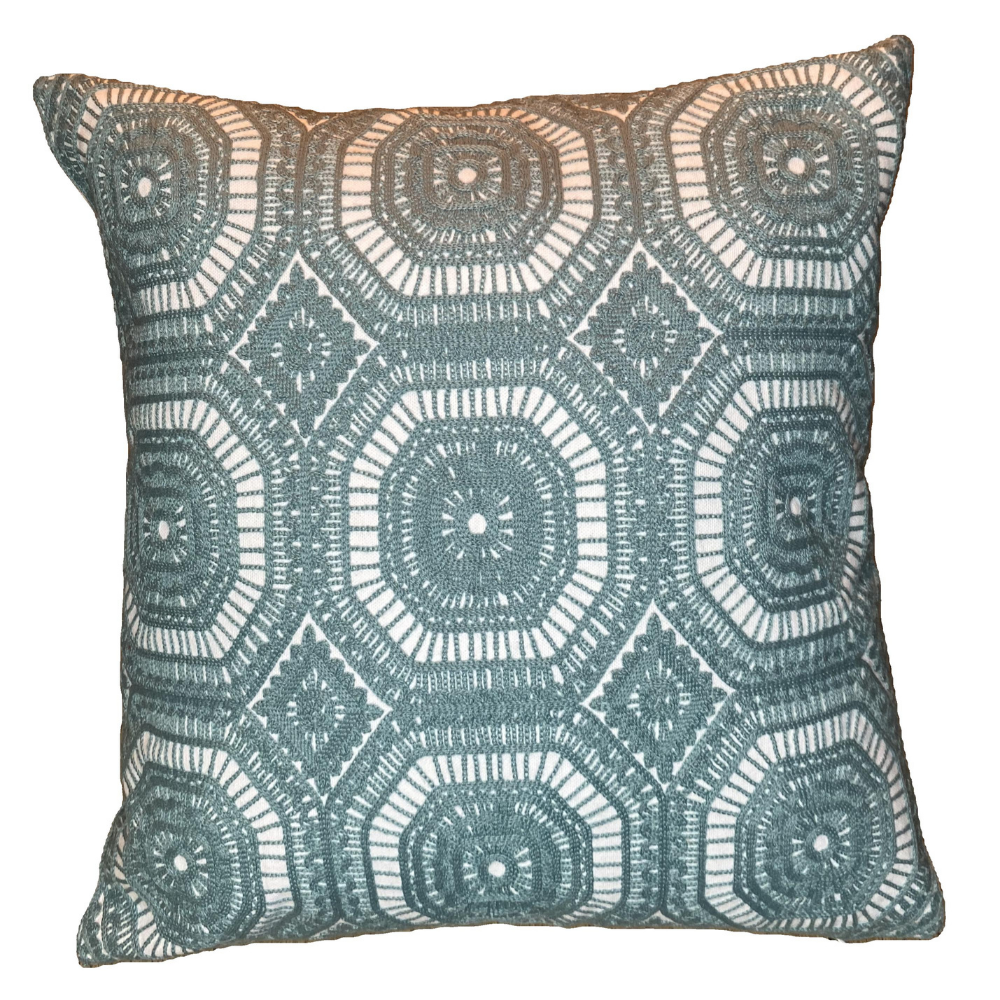 Decorative pillow with geometric pattern on a white background