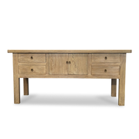 Wooden console table with four drawers on a white background