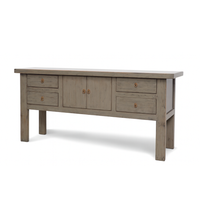 Wooden sideboard with multiple drawers and doors on a white background
