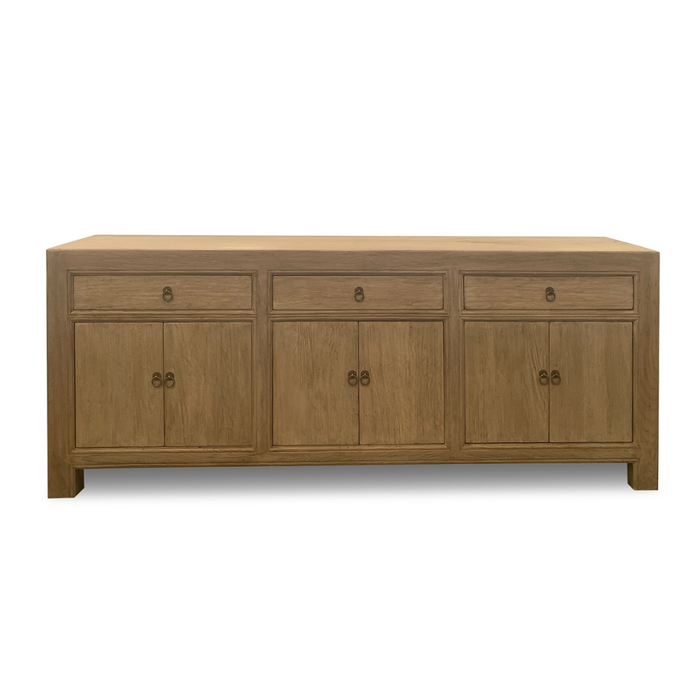 Wooden sideboard with doors and drawers on a white background
