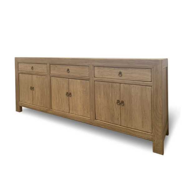 Wooden sideboard with drawers and doors on a white background