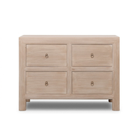 Beige wooden chest of drawers with four drawers on a white background