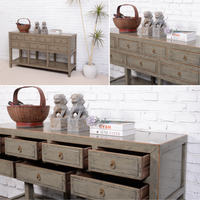 Collage of a wooden console table with decorative items against a white brick wall.