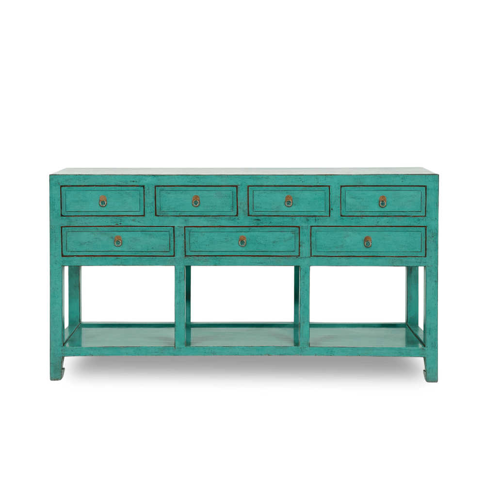 Teal console table with multiple drawers on a white background
