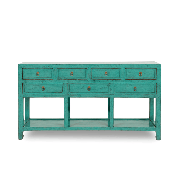 Teal console table with multiple drawers on a white background