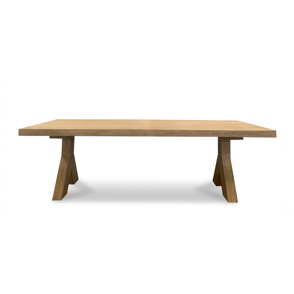 Wooden dining table on a white background