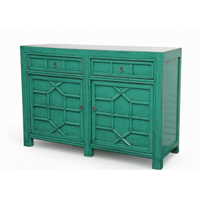 Teal sideboard with geometric design on a white background