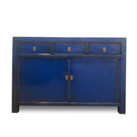 Blue wooden sideboard with two doors and three drawers on a white background