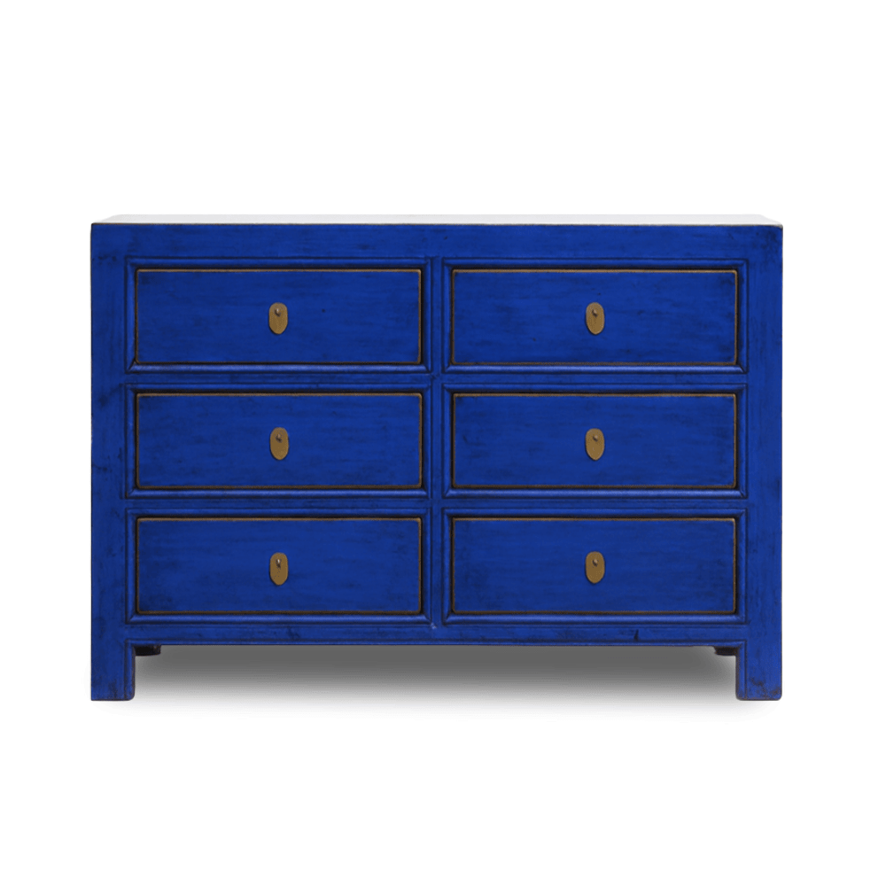 Blue dresser with six drawers on a white background
