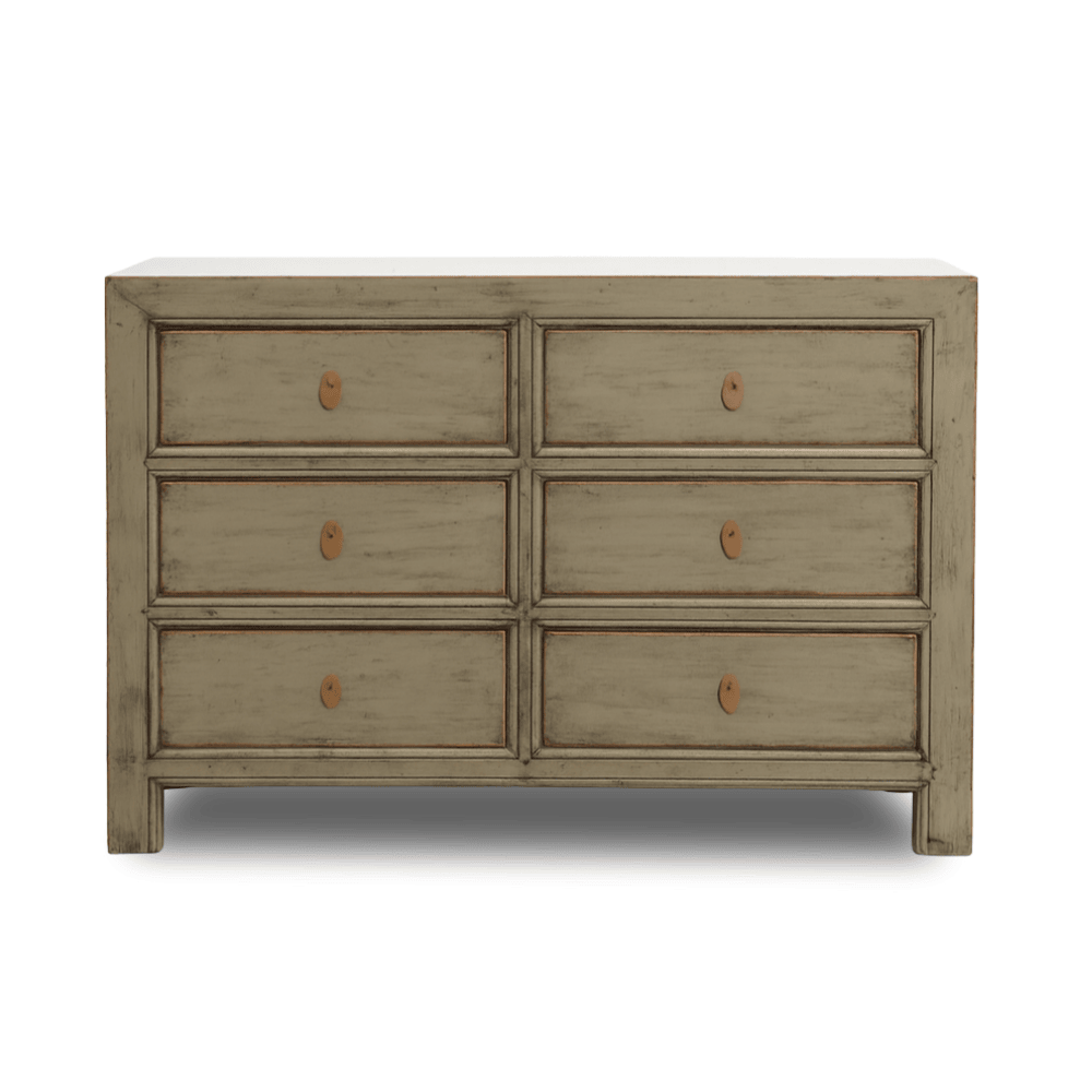 Wooden dresser with six drawers on a white background