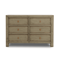 Wooden dresser with six drawers on a white background