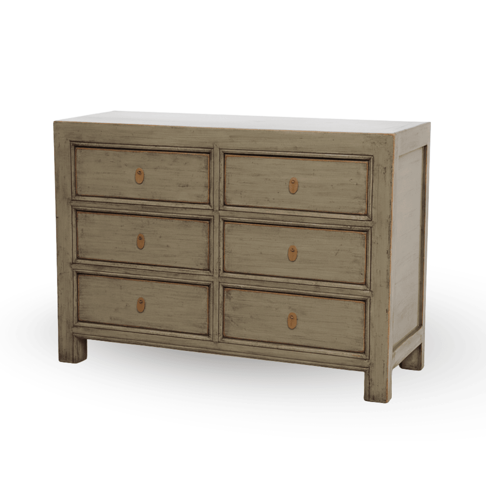 Wooden dresser with six drawers on a white background