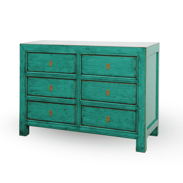 Green dresser with six drawers on a white background