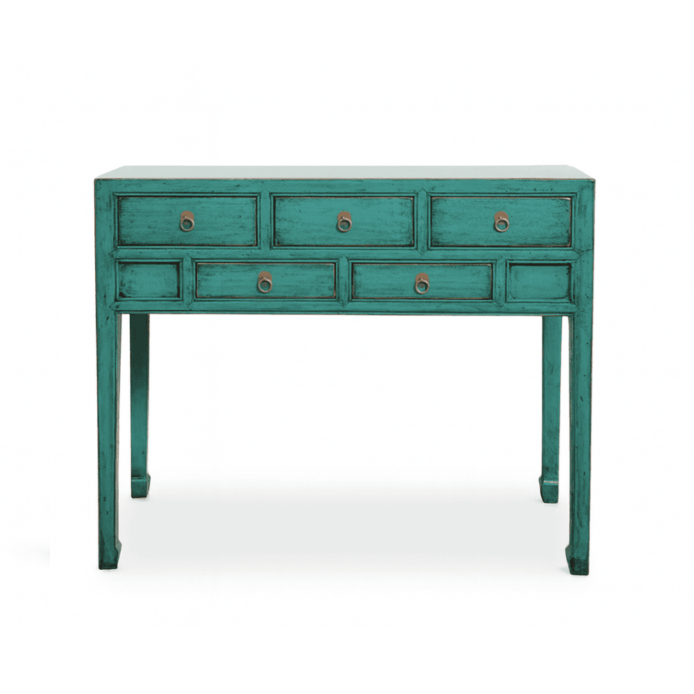 Teal console table with multiple drawers on a white background
