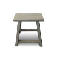 Small wooden side table with a grayish-brown finish on a white background