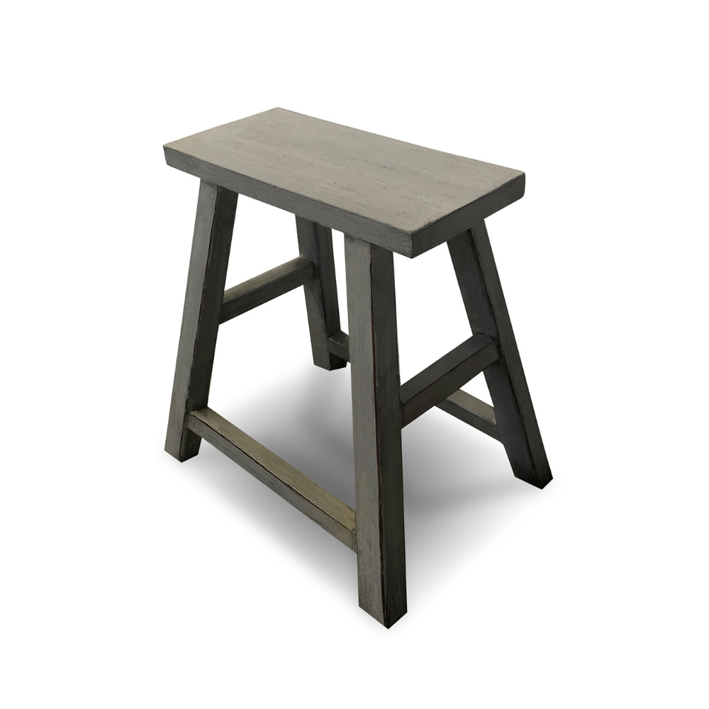 Wooden stool with a grayish-brown top and black legs on a white background