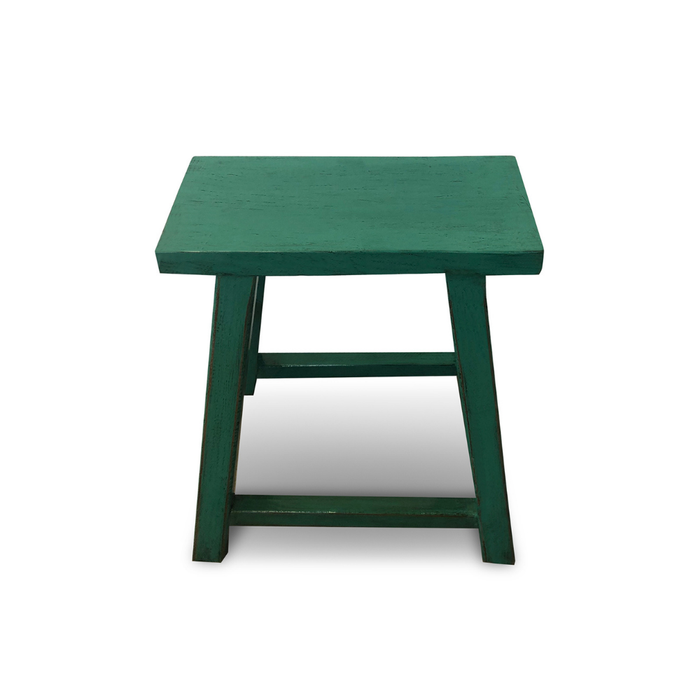 Green wooden stool on a white background
