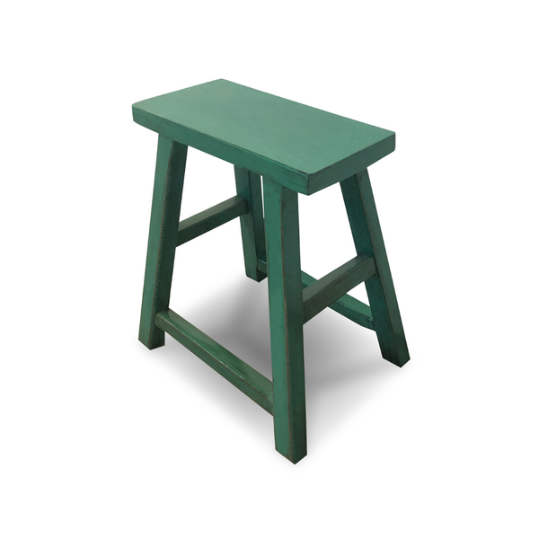 Green wooden stool on a white background